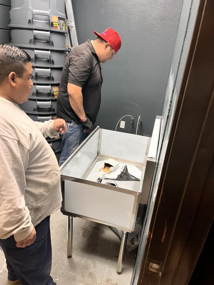 Commercial plumbing and sink installation in Kingston